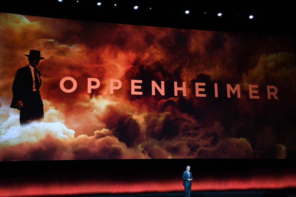 Director Christopher Nolan speaks on stage about his movie "Oppenheimer". 