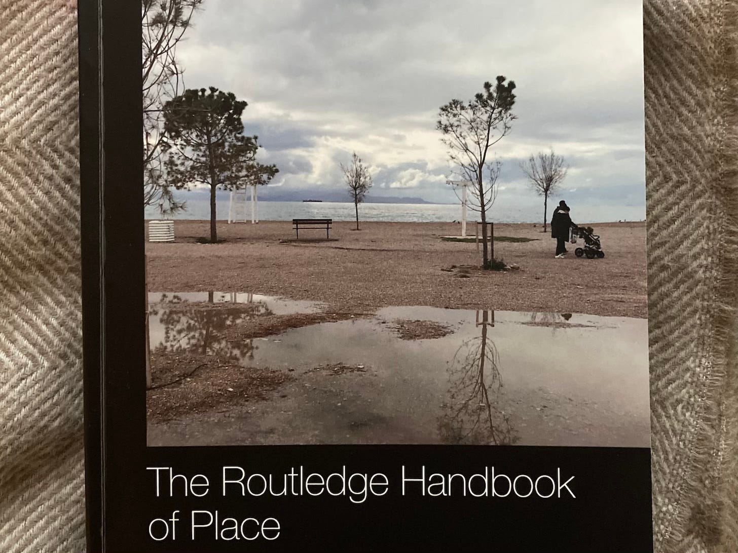 an image of a book with the title The Routledge Handbook of Place