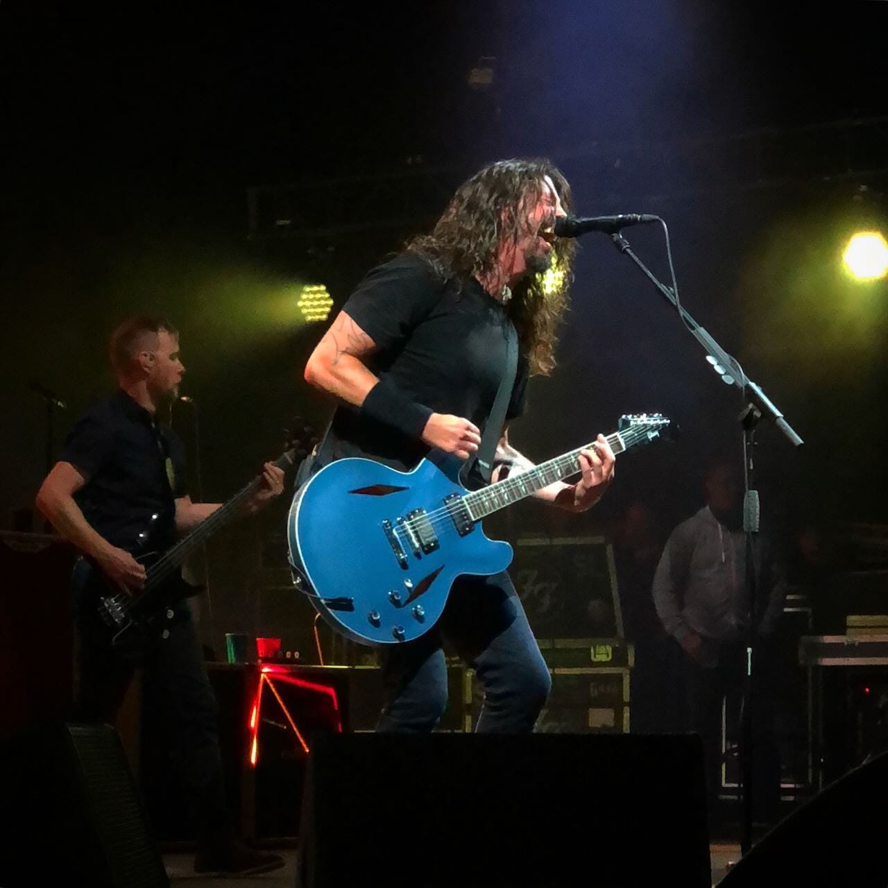 Foo Fighters playing on stage in Houston, TX