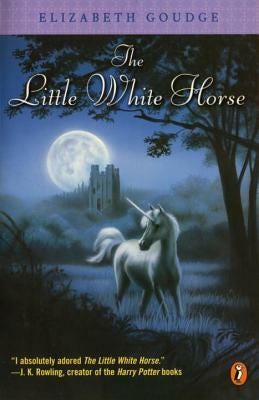 review of classic fantasy the little white horse by elizabeth goudge, cover has while unicorn with castle and moon in background in a dreamy scene