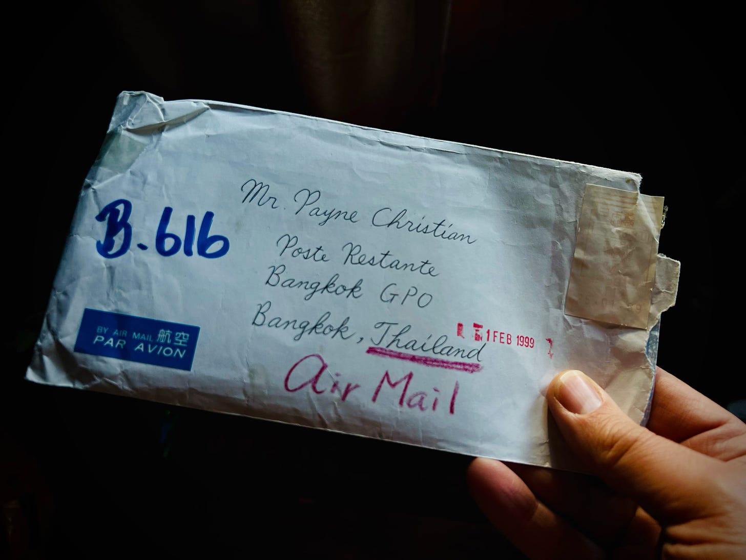 An envelope is addressed to Mr Christian, Payne, post rest, Dante Bangkok, GPO, Bangkok, Thailand, it is dated the 1st of February 1999
