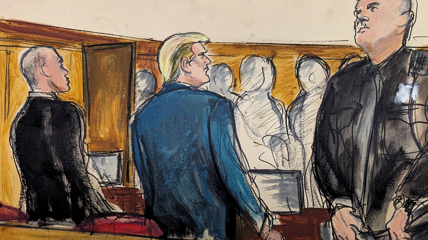 This artist depiction shows Donald Trump standing as the jury files into the courtroom at the start of the trial in Manhattan criminal court.