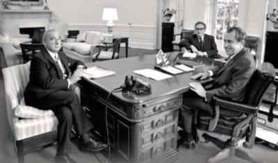 Pentagon Strategist Fritz G.A. Kraemer, National Security Advisor Henry Kissinger, and President of the United States of America Richard Nixon at the Oval Office, The White House in Washington DC.