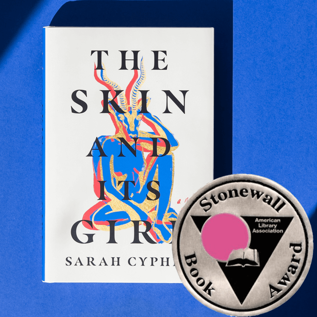 A book cover appears against a cobalt blue background, foregrounded by the silver Stonewall Book Award seal