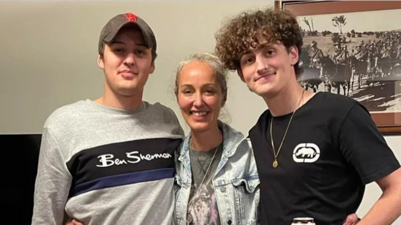 Caleb Pace (left) with his mother Michelle and brother Cy. Picture: GoFundMe