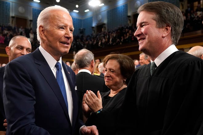 Feb 7, 2023; Washington, DC, USA; President Joe Biden greets Supreme Court Justice Brett Kavanaugh as he arrives to delivers the State of the Union address to a joint session of Congress at the Capitol, Tuesday, March 1, 2023, in Washington. Mandatory Credit: Jacquelyn Martin/Pool-USA TODAY NETWORK



 ORIG FILE ID:  20230207_nbr_usa_096.JPG