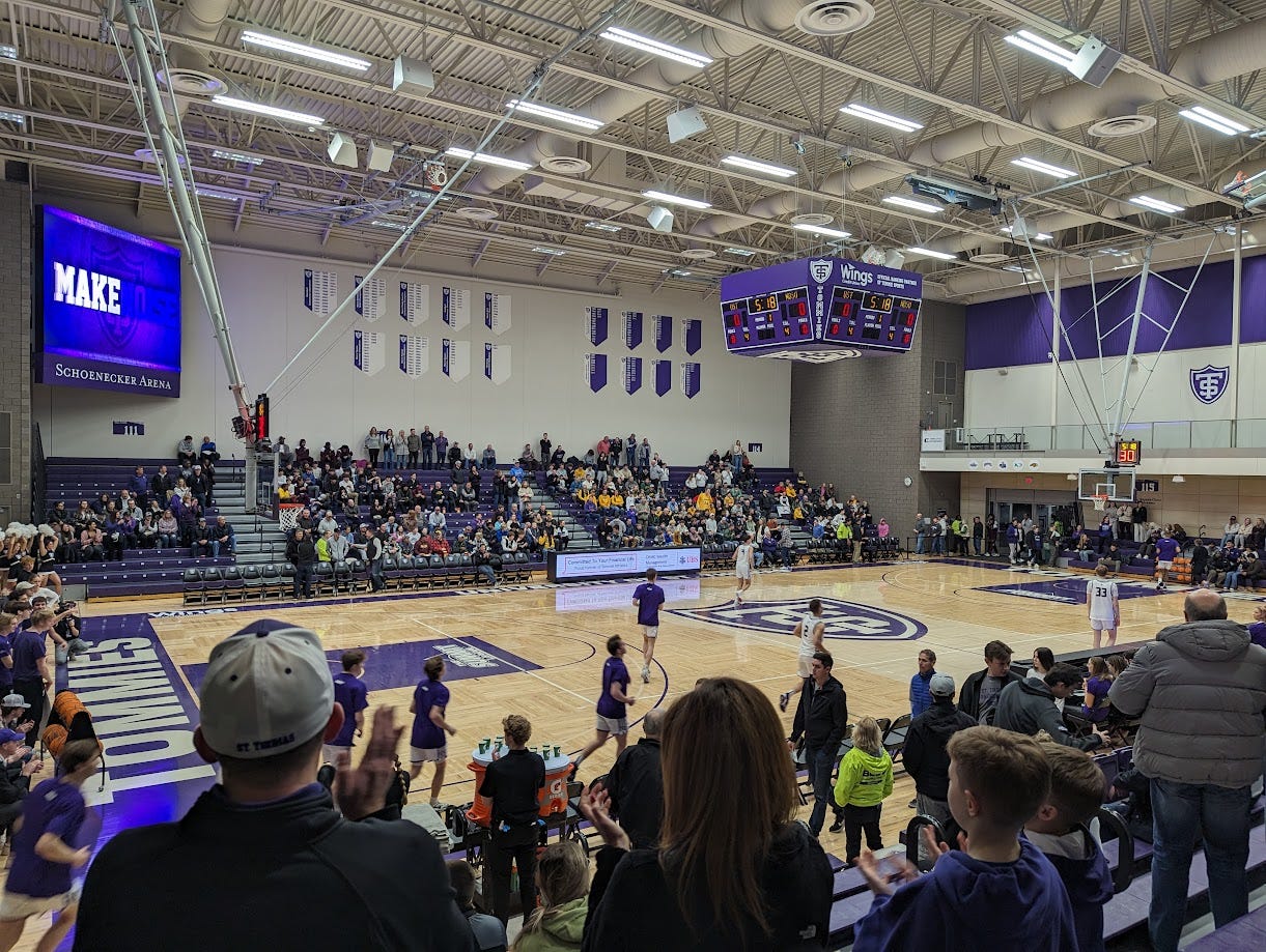 Schoenecker Arena from the near side of the court, behind the St. Thomas bench