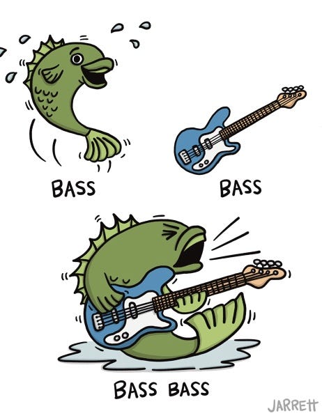 A green fish is labelled “BASS”. A blue guitar is labelled “BASS.”  The green fish is playing the blue guitar and looking really into playing it. The label says “BASS BASS.”