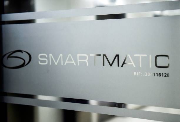 Picture of the logo of Smartmatic, the firm that supplies Venezuela's voting technology, seen on a sliding door at the headquarters of the company in...