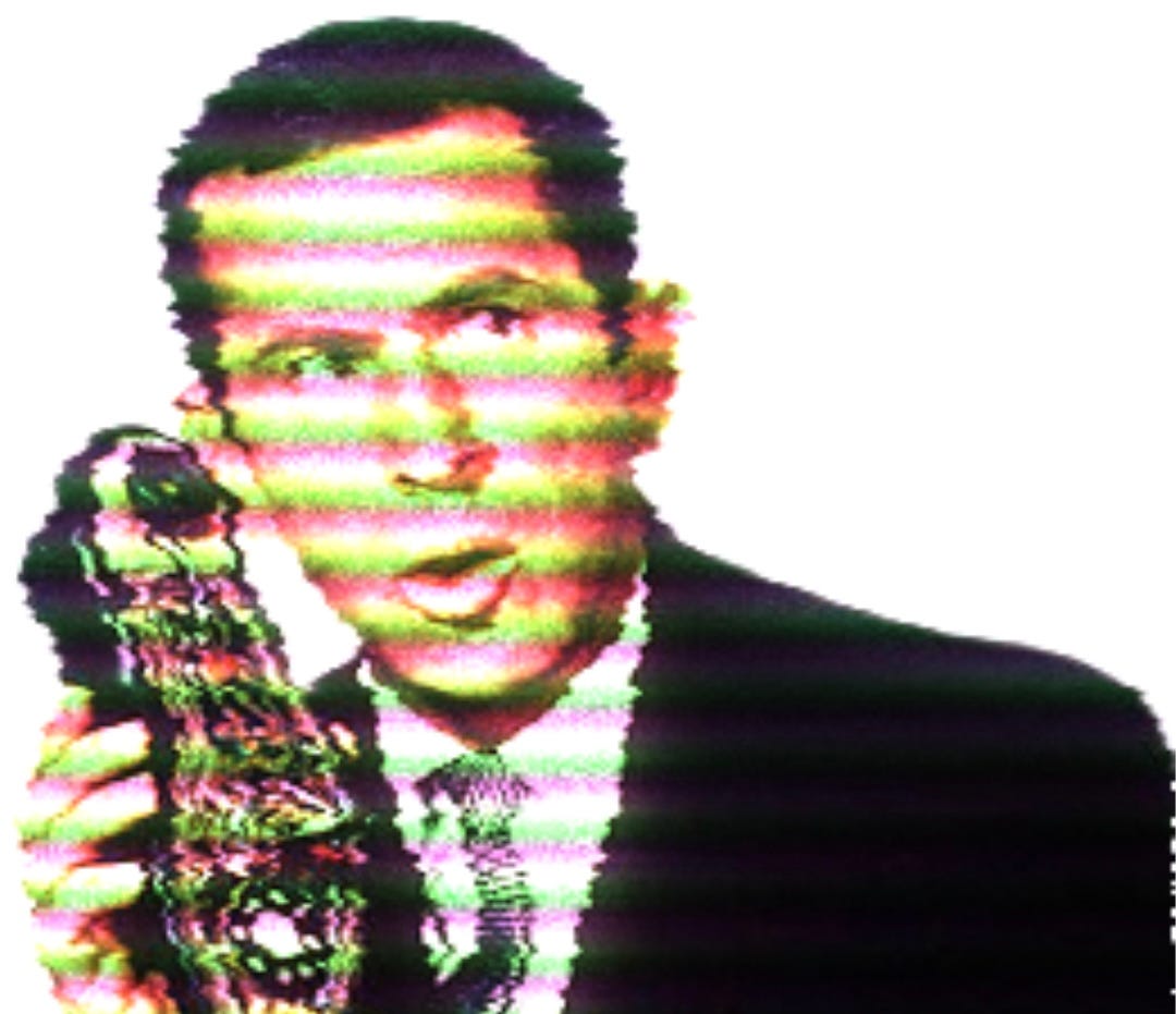 Image of Maxwell Smart talking into a shoe phone with horizontal lines running across the image
