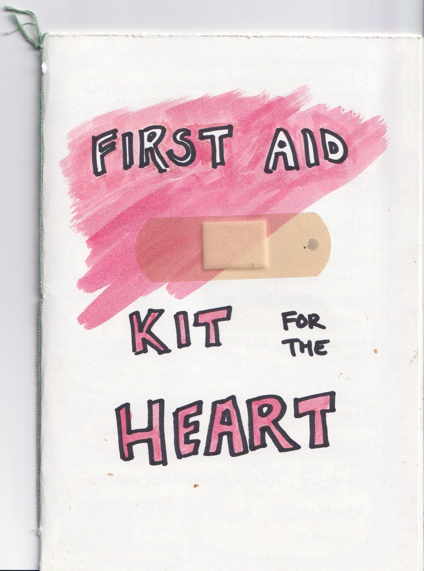 A photo scan of a water color and pastel zine.  The cover says “First Aid Kit for the Heart, and a bandaid is stuck in the middle”