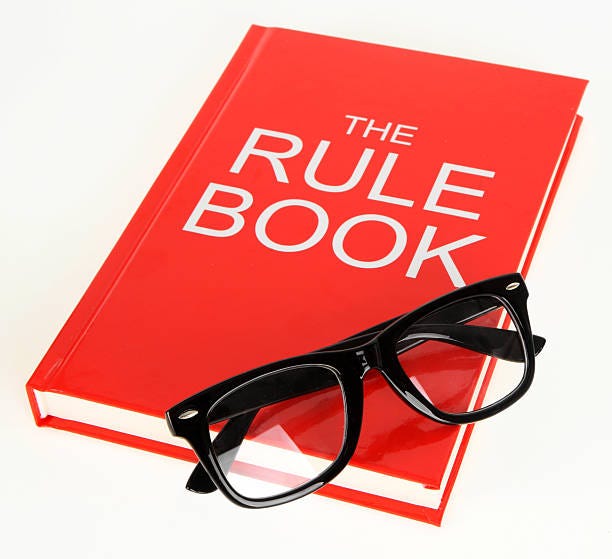 Study The Rule Book Stock Photo - Download Image Now - Rules, Book, Cut Out  - iStock