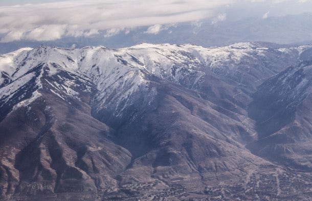 I love how rugged and snowy they look even from above. 