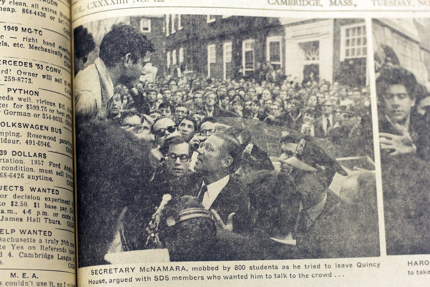 Secretary McNamara is shown being mobbed by 800 students in Quincy courtyard in 1967.