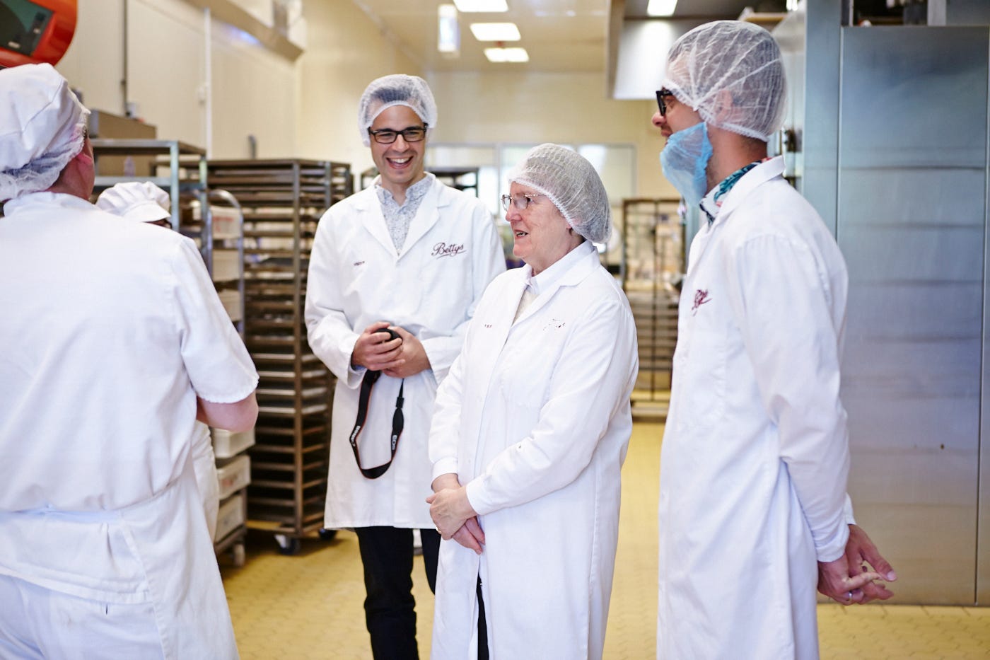 People touring Bettys Craft Bakery.