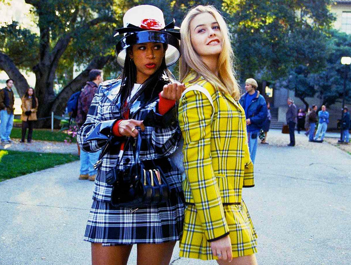 Dionne and Cher in their plaid Clueless outfits.