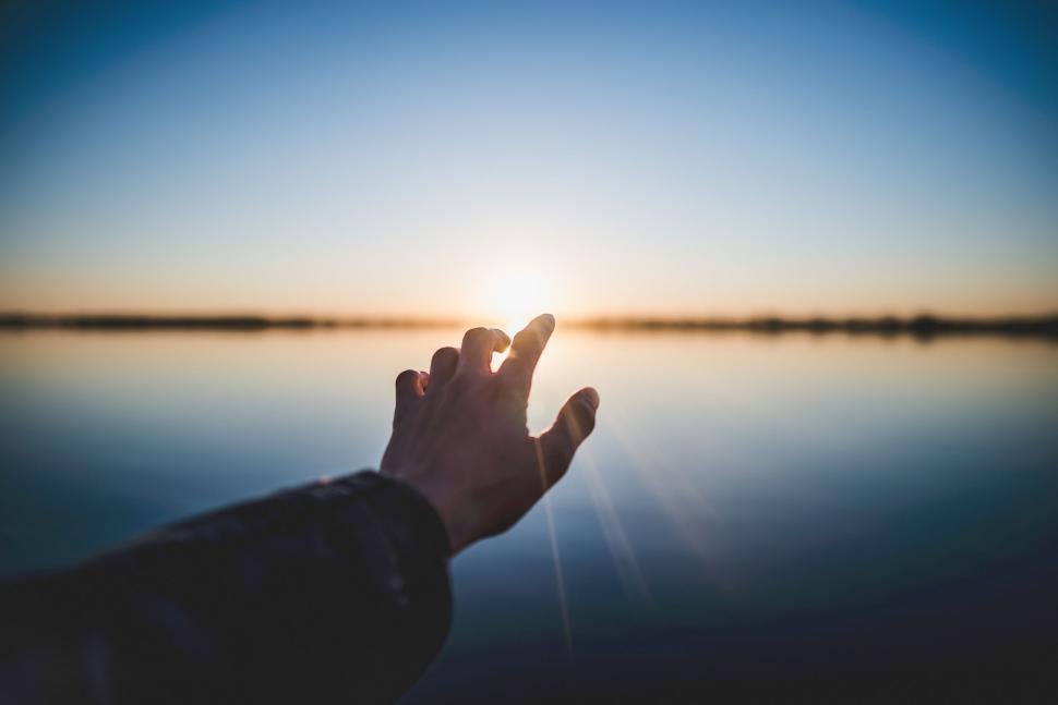 Free Stock Photo of Hand reaching towards sun above lake | Download Free  Images and Free Illustrations