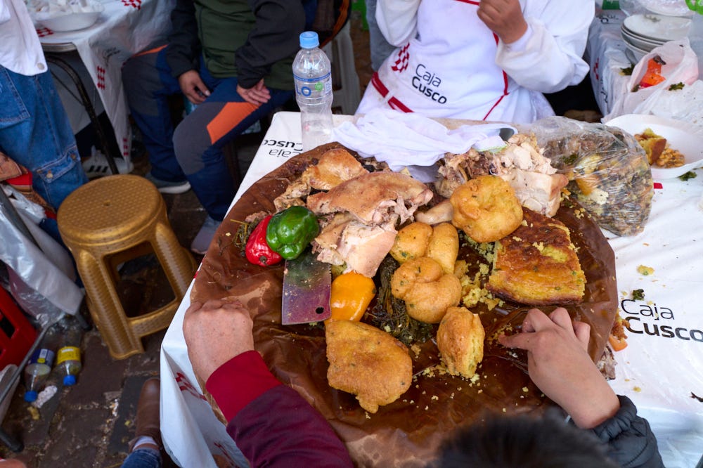 Two hands hungrily take pieces of chiriuchu for tasting.