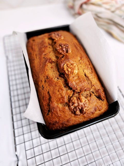 Richard Makin's banana bread in a tin on a cooling rack