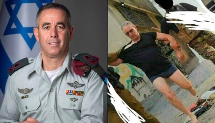 Major General Nimrod Aloni (right) allegedly being taken by Hamas fighters. — The Telegraph