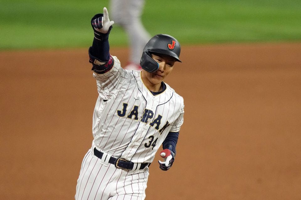 Masataka Yoshida returns to Red Sox camp as a champion after turning heads  at World Baseball Classic - The Boston Globe