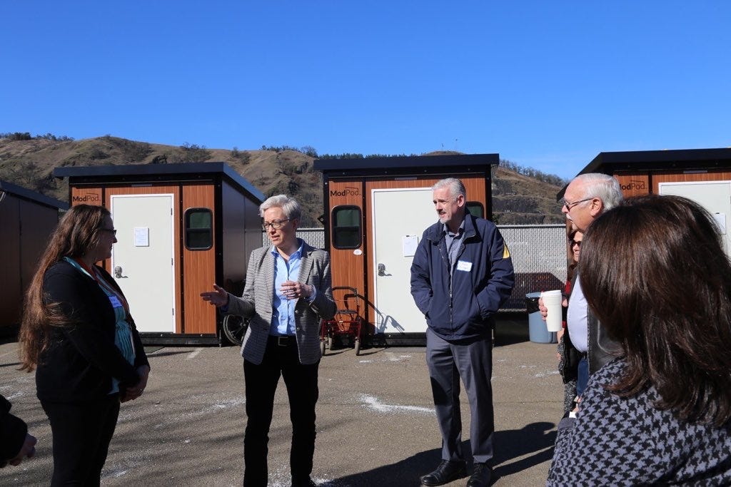 May be an image of 4 people, people standing and outdoors