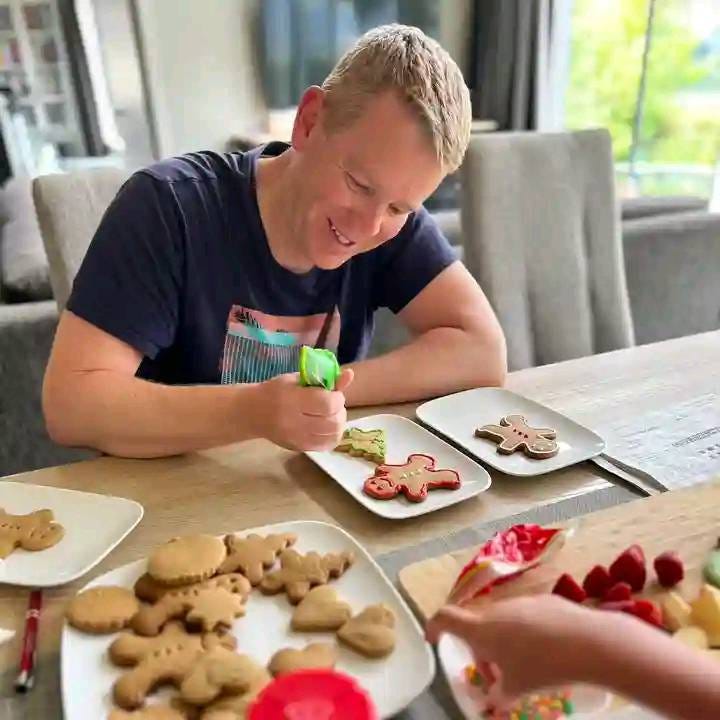 May be an image of 1 person and gingerbread biscuit