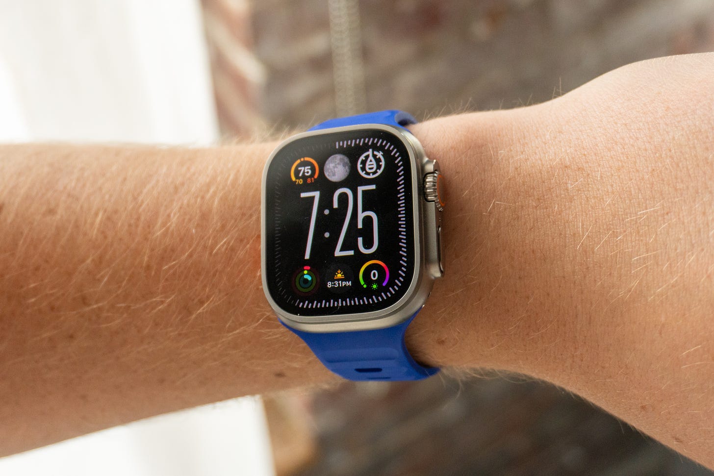 Apple Watch Ultra 2 in The Verge Blurple Nomad band.