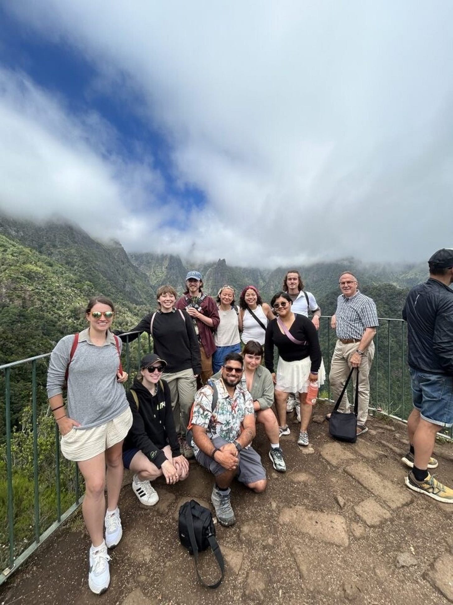 The Professional Horticulture Class of 2024 and Longwood Associate Director of Collections Tony Aiello, overlooking the laurisilva at Levada dos Balcões. Standing (from left): Caroline Colino, Charli Klein, Sammy Winderman, Kelsey Chai, Abi Urena, Victoria Fuentes, Noah Meanix, and Tony Aiello. Sitting (from left): Madison Claydon, Carlos Rodriguez, and Sam Paine. Photo by Andrew Gurka