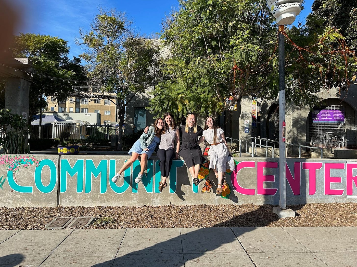 DFP's Climate Team posing in front of community center in San Diego.