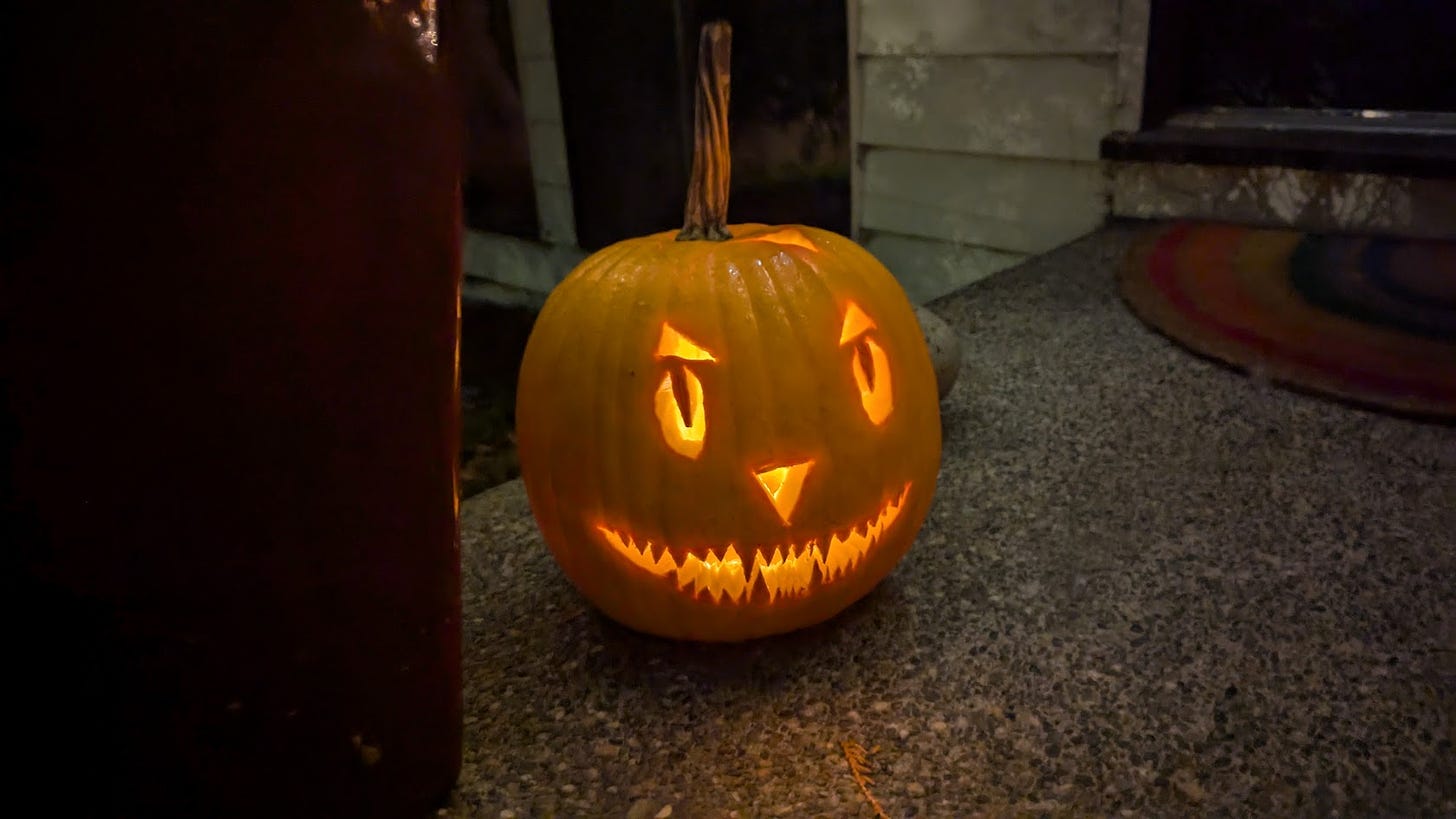 A carved pumpkin lit from inside