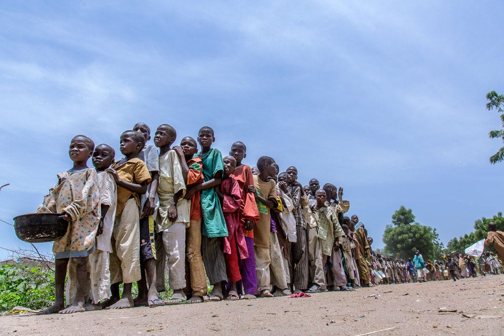 On 12 August 2016 internally displaced children waiting for ready-to-use therapeutic food (RUTF) distribution in Banki IDP camp, Borno state, northeast Nigeria. Photo: UNICEF/Andrew Esiebo