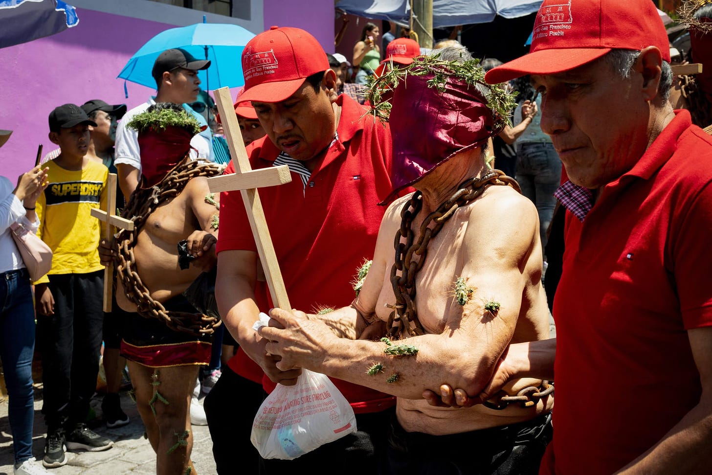 Los Engrillados of Atlixco: Mexican men in shackles with cacti stuck in their skin walk in pain to wash away their sins