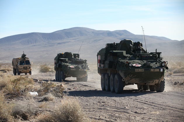 U.S. Army Strykers are pictured.