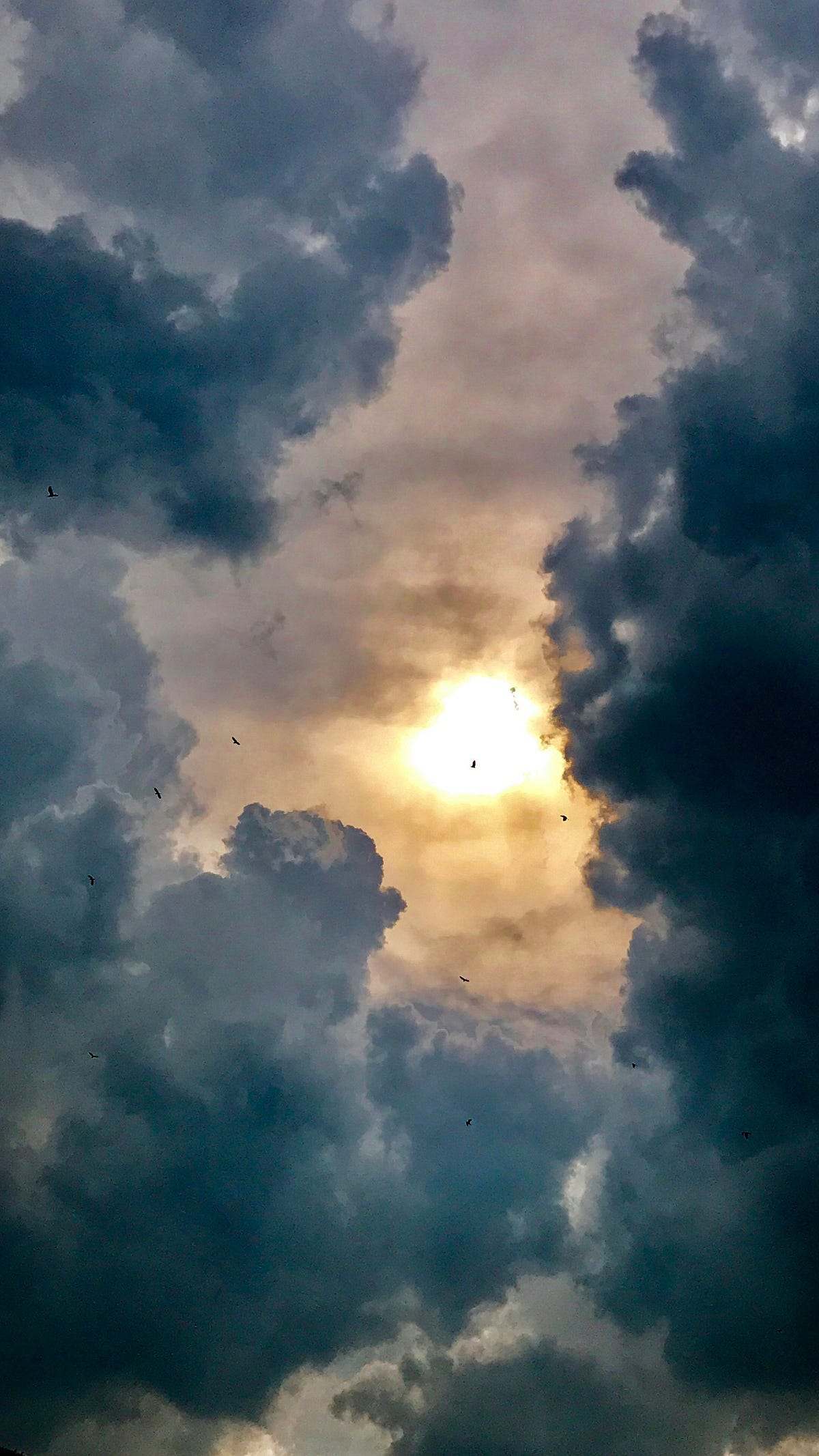 Dark clouds with Sun