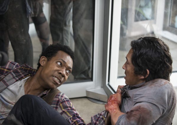 noah getting pulled by zomies to die in walking dead spend 2015