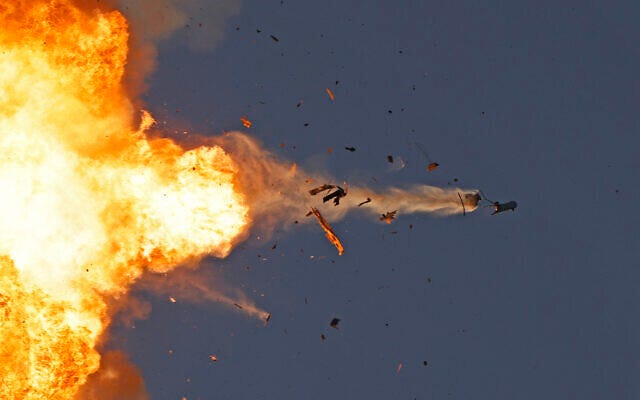 This photo taken from a position in northern Israel shows a Hezbollah drone intercepted by Israeli air defense over north Israel on August 25, 2024 (Jalaa MAREY / AFP)