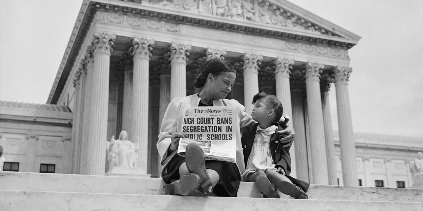Mother and Daughter at U.S. Supreme CourtNettie Hunt and her daughter Nickie sit on the steps of the U.S. Supreme Court. Nettie explains to her daughter the meaning of the high court's ruling in the Brown Vs. Board of Education case that segregation in public schools is unconstitutional.