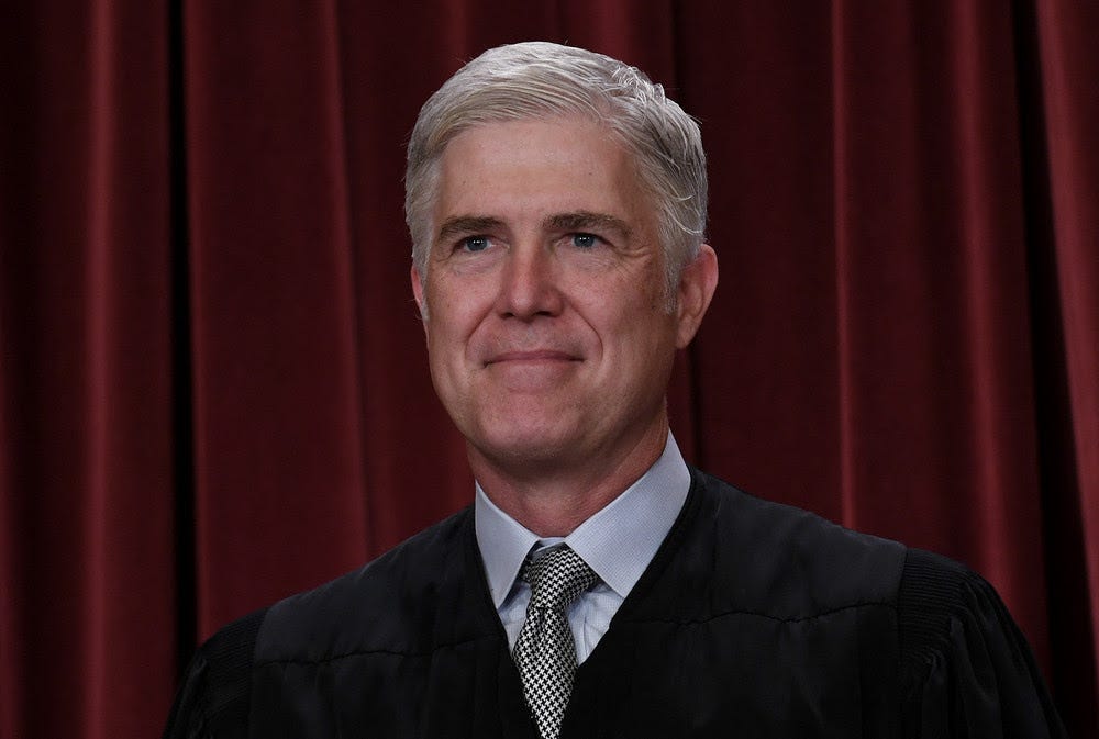 Chief US Supreme Court Justice Neil Gorsuch poses for the official photo at the Supreme Court in Washington, DC on October 7, 2022. (Photo by OLIVIER DOULIERY / AFP) (Photo by OLIVIER DOULIERY/AFP via Getty Images)