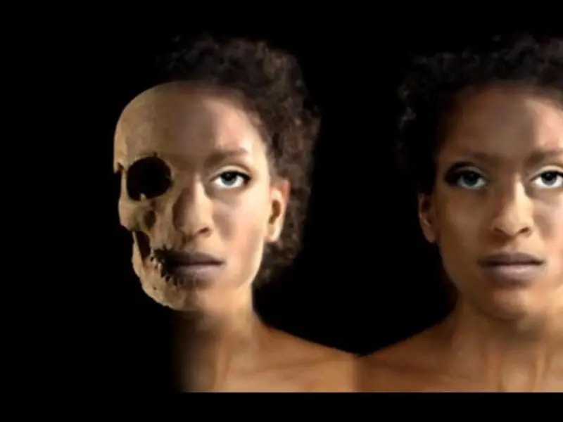A north african woman's face has been recreated over her skull. The digital image is lifelike on a black backgroud