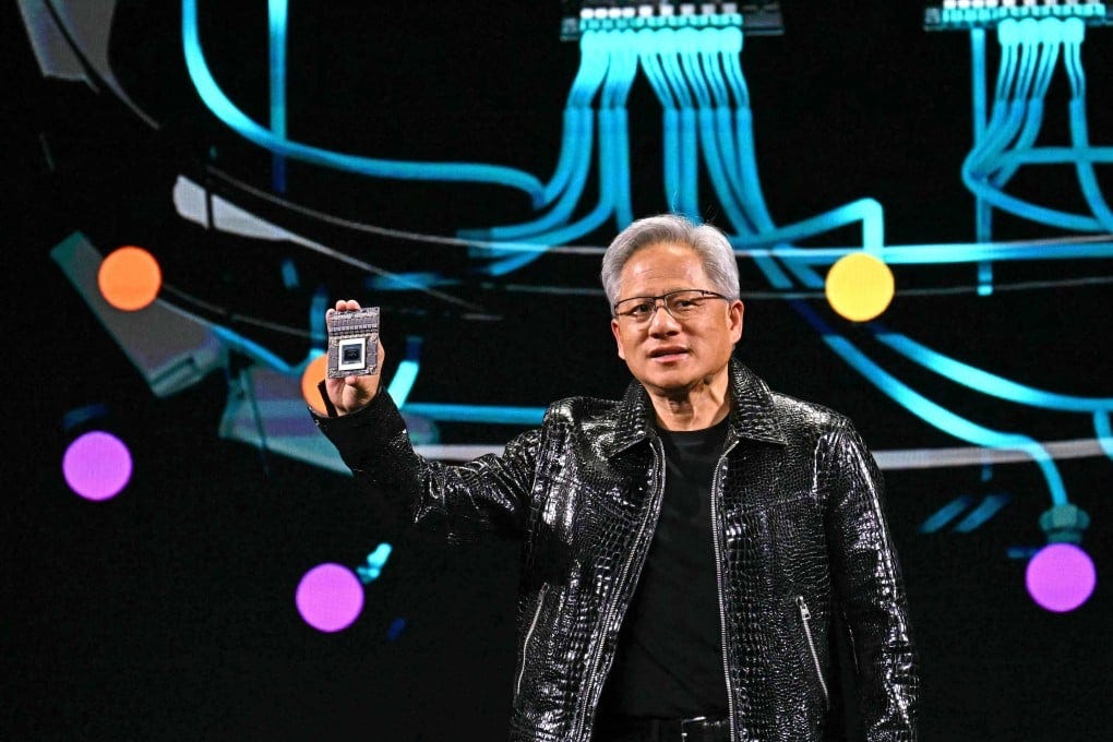 Nvidia CEO Jensen Huang holds up a processor as he delivers a keynote address at CES in Las Vegas, Nevada on January 6, 2025. Photo: AFP