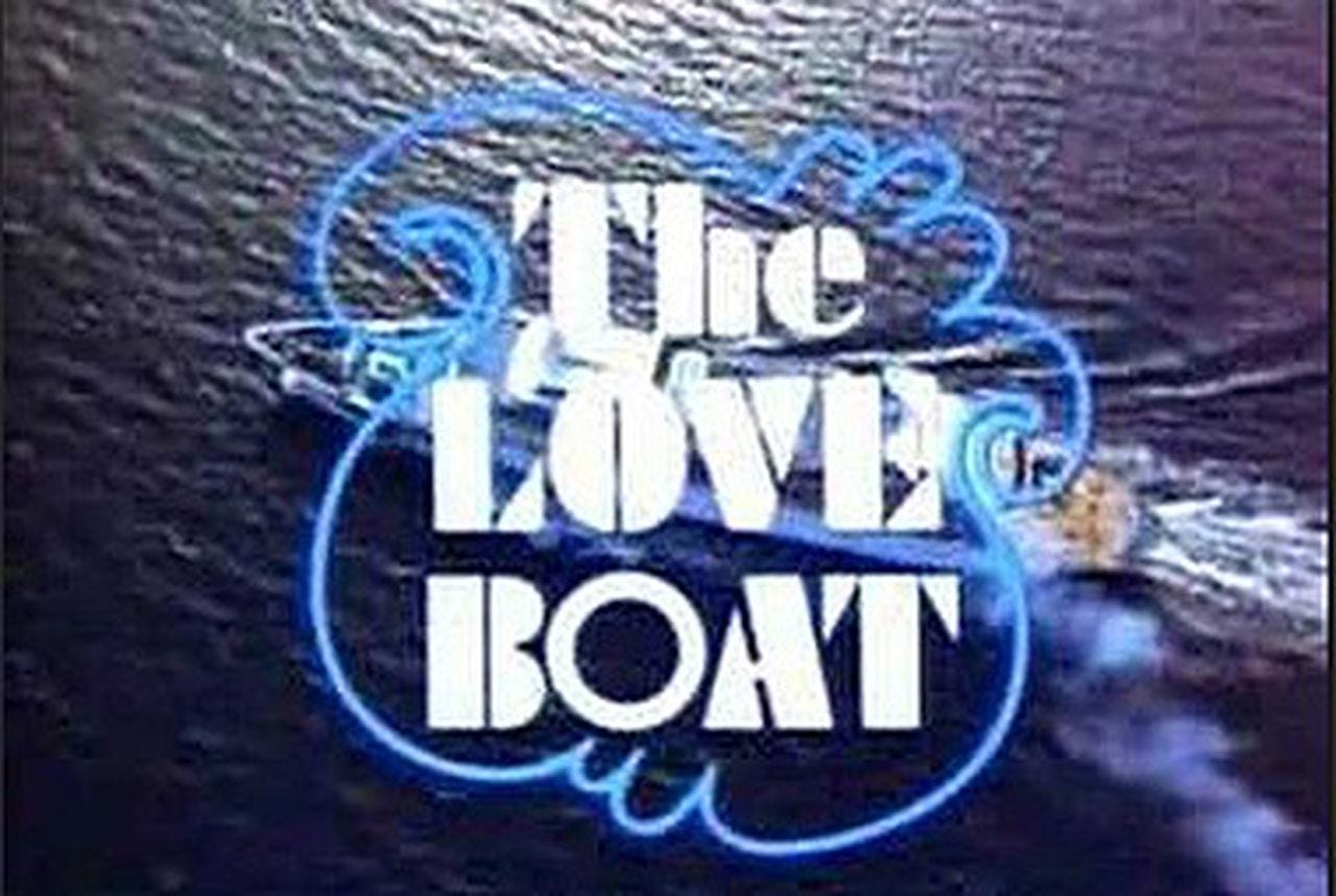 The opening credit shot for THE LOVE BOAT, showing the logo superimposed over a helicopter shot of a cruise boat.