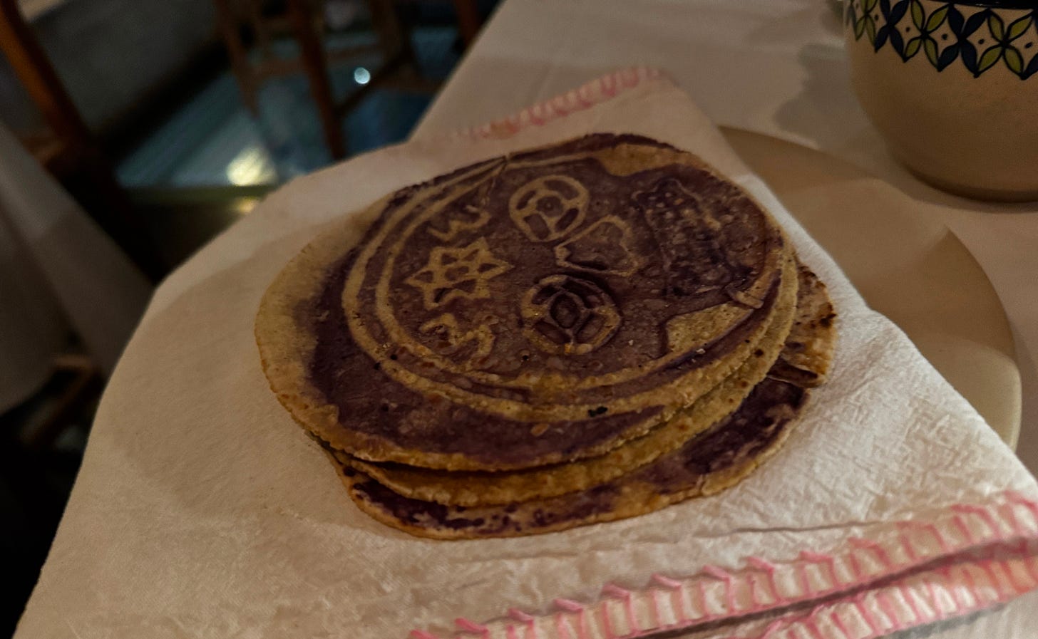 Homemade tortillas with floral designs at Azul