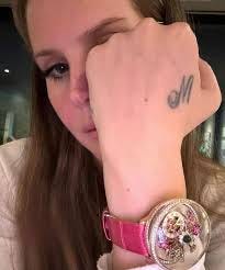 Lanasendless | Fan Account | Lana Del Rey and her Iconic new @jacobandco  watch 🌸 plus her timeless Tattoo of the letter “M” for her grandmother,  Madeleine. She... | Instagram