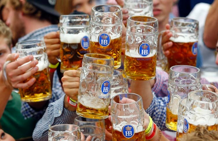 Clinking beer steins Clinking beer steins
