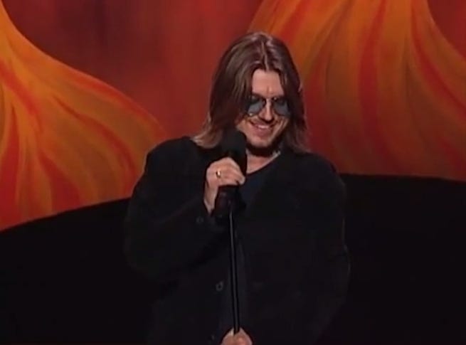 Mitch Hedberg at a Microphone