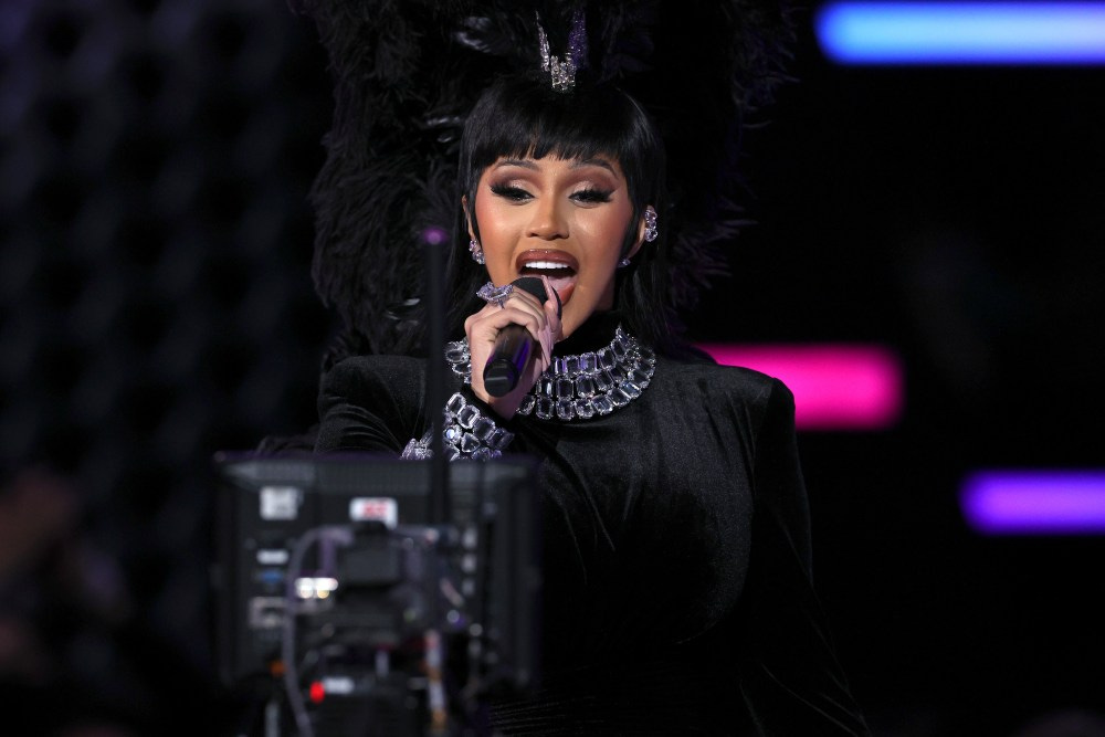 LOS ANGELES, CALIFORNIA - NOVEMBER 21: Host Cardi B speaks onstage during the 2021 American Music Awards at Microsoft Theater on November 21, 2021 in Los Angeles, California. (Photo by Kevin Winter/Getty Images for MRC)