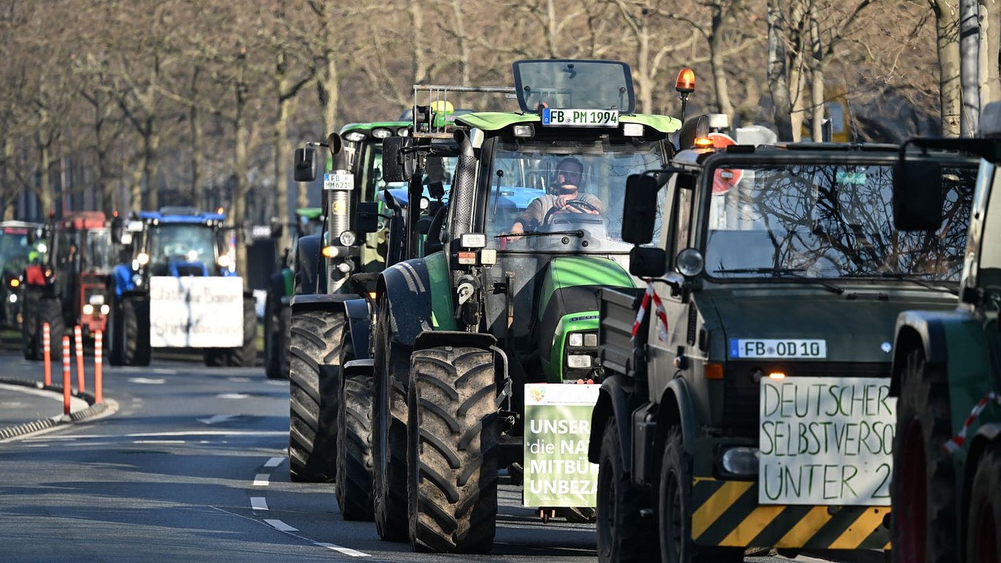 Farmers demonstrate against government plans to scrap diesel tax subsidies for agriculture vehicles in Frankfurt, western Germany, on January 11, 2024. Farmers have been up in arms over government plans to withdraw tax breaks for the agricultural sector. The government already partially walked back the planned subsidy cuts. A discount on vehicle tax for agriculture would remain in place, while a diesel subsidy would be phased out over several years instead of being abolished immediately, the government said. (Photo by Kirill KUDRYAVTSEV / AFP) (Photo by KIRILL KUDRYAVTSEV/AFP via Getty Images)
