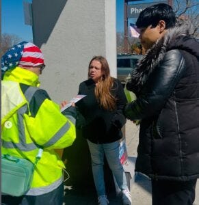 Jozette Carter-Williams speaking to a voter on Forest Avenue on Staten Island