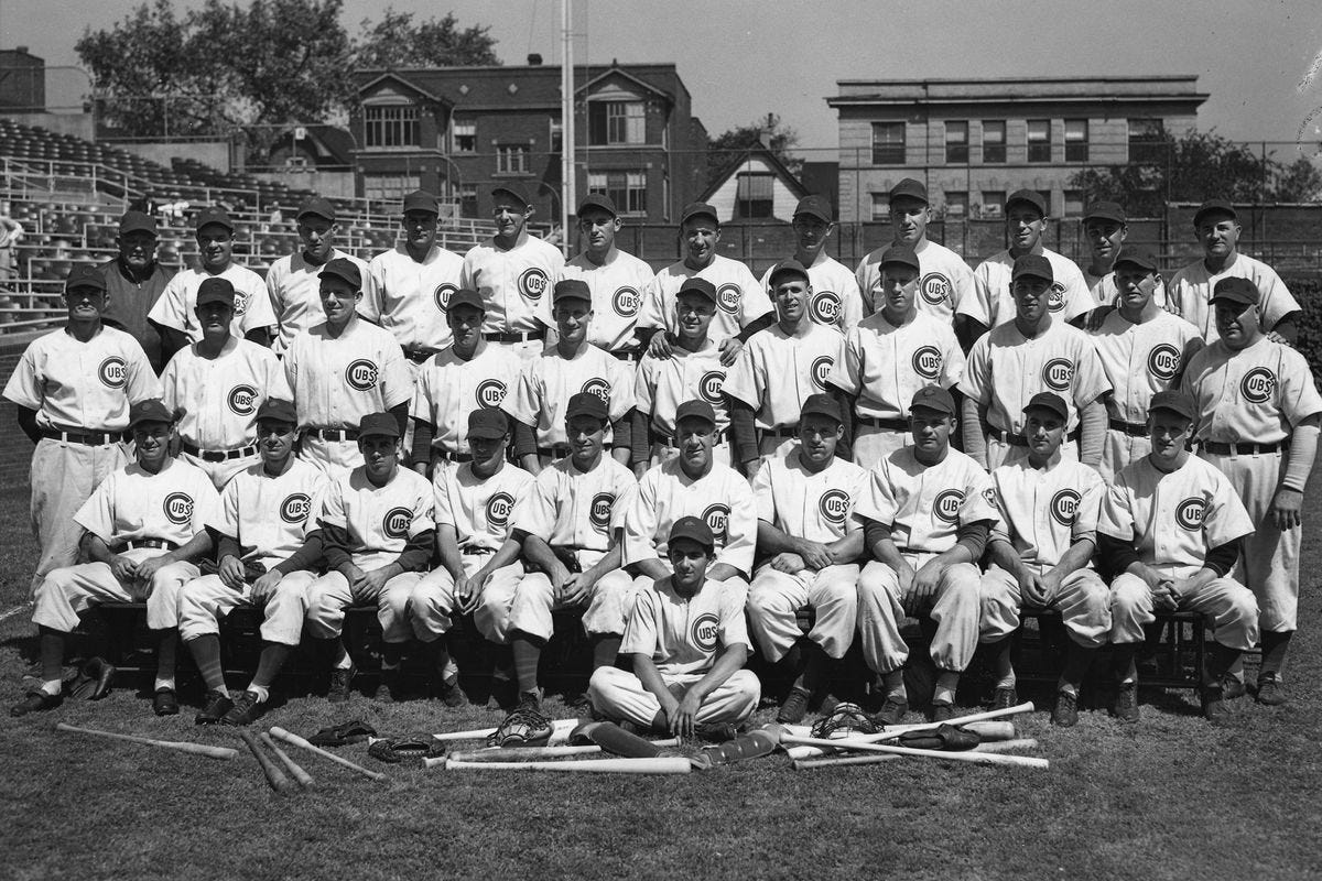 The Chicago Cubs of 1945, 3 rows of men in white baseball uniforms in a black and white photo